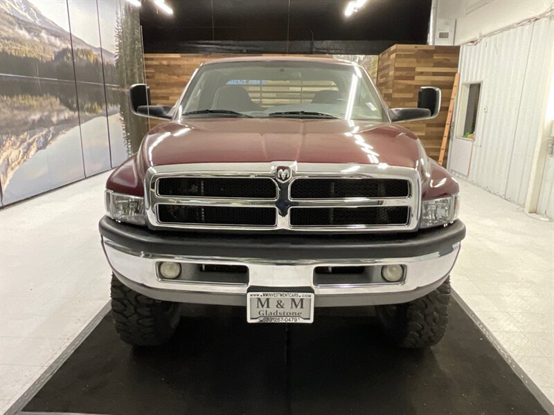 2002 Dodge Ram 2500 4dr SLT 4X4/5.9L DIESEL/6-SPEED/ LIFTED /FLAT BED  /LIFTED w. BRAND NEW 35 " MUD TIRES / 6-SPEED MANUAL  & EXHAUST BRAKE / LOCAL TRUCK / RUST FREE / 161,000 MILES - Photo 5 - Gladstone, OR 97027