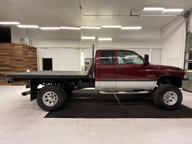 2002 Dodge Ram 2500 4dr SLT 4X4/5.9L DIESEL/6-SPEED/ LIFTED /FLAT BED  /LIFTED w. BRAND NEW 35 " MUD TIRES / 6-SPEED MANUAL  & EXHAUST BRAKE / LOCAL TRUCK / RUST FREE / 161,000 MILES - Photo 4 - Gladstone, OR 97027