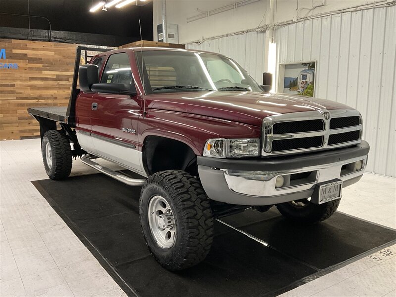 2002 Dodge Ram 2500 4dr SLT 4X4/5.9L DIESEL/6-SPEED/ LIFTED /FLAT BED  /LIFTED w. BRAND NEW 35 " MUD TIRES / 6-SPEED MANUAL  & EXHAUST BRAKE / LOCAL TRUCK / RUST FREE / 161,000 MILES - Photo 2 - Gladstone, OR 97027