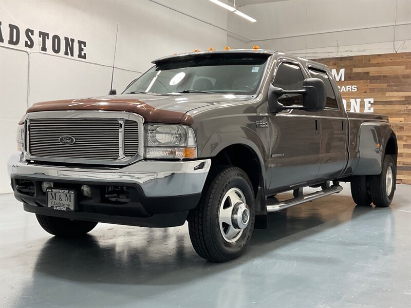 2002 Ford F-350 Lariat 4X4 / 7.3L DIESEL / 6-SPEED / DUALLY  / 1-OWNER LOCAL / ZERO RUST / Leather Heated Seats / Crew Cab / 83K MILES - Photo 1 - Gladstone, OR 97027