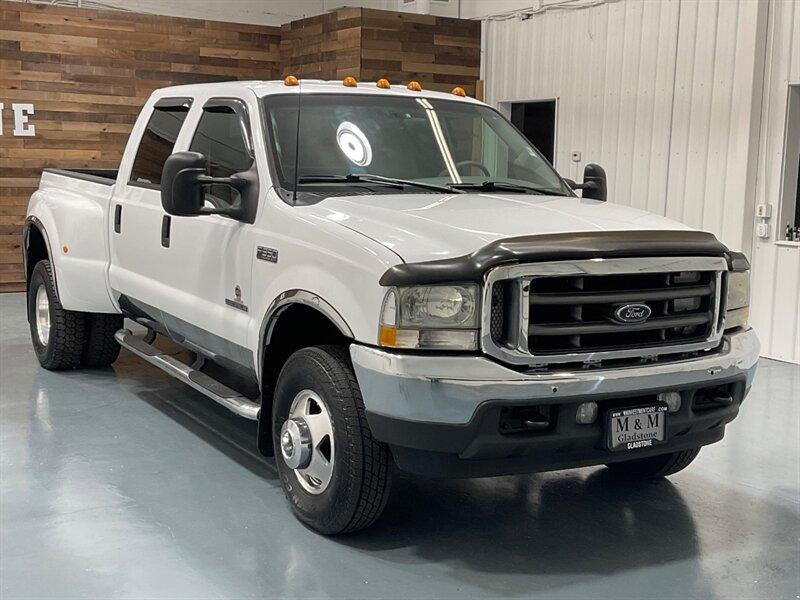 2002 Ford F-350 Lariat 4X4 / 7.3L DIESEL /6-SPEED/DUALLY/91K MILES  / ZERO RUST / Crew Cab / Leather Heated Seats / 1-TON Super Duty / 6-SPEED MANUAL / SHORT BED - Photo 2 - Gladstone, OR 97027