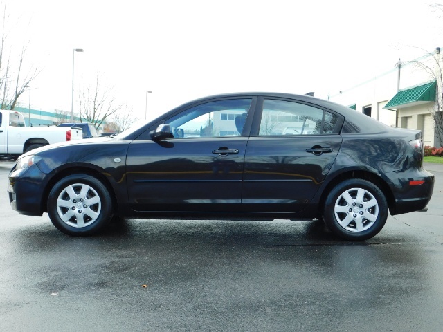 2009 Mazda Mazda3 i Sport / Sedan / 5-SPEED MANUAL / LOW MILES - Photo 3 - Portland, OR 97217