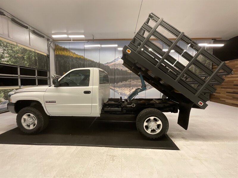 2001 Dodge Ram 2500 2-Door 4X4 / 5.9L DIESEL / 6-SPEED / TILT UP BED  / 1-OWNER LOCAL OREGON TRUCK / RUST FREE / FLAT BED TILT UP / STANDARD CAB / 158,000 MILES - Photo 3 - Gladstone, OR 97027