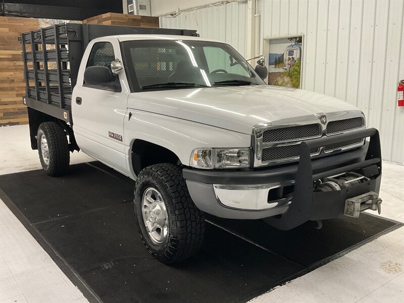 2001 Dodge Ram 2500 2-Door 4X4 / 5.9L DIESEL / 6-SPEED / TILT UP BED  / 1-OWNER LOCAL OREGON TRUCK / RUST FREE / FLAT BED TILT UP / STANDARD CAB / 158,000 MILES - Photo 2 - Gladstone, OR 97027