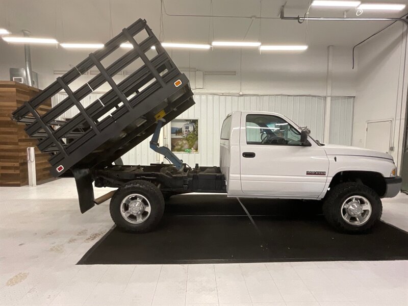 2001 Dodge Ram 2500 2-Door 4X4 / 5.9L DIESEL / 6-SPEED / TILT UP BED  / 1-OWNER LOCAL OREGON TRUCK / RUST FREE / FLAT BED TILT UP / STANDARD CAB / 158,000 MILES - Photo 4 - Gladstone, OR 97027