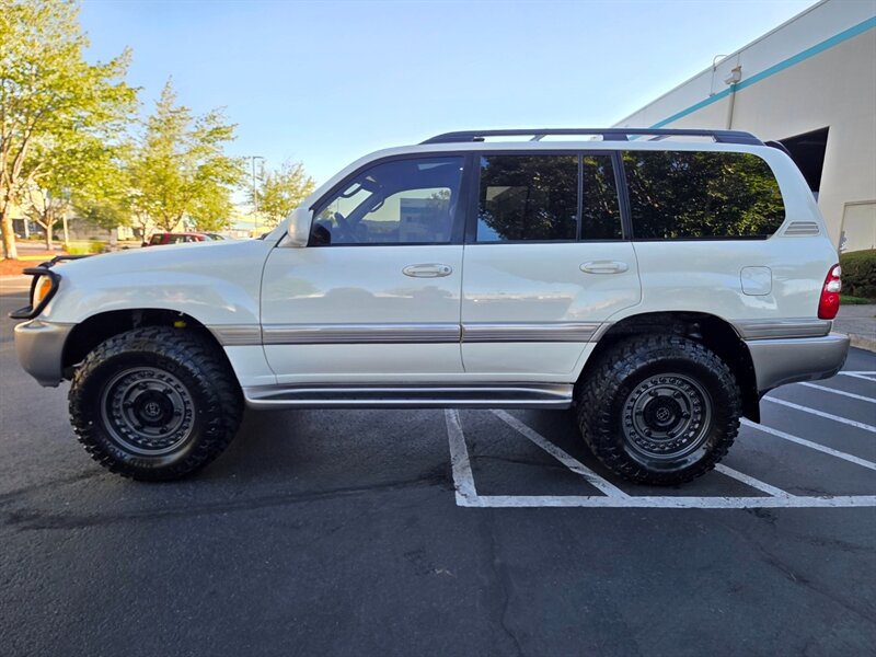 2003 Toyota Land Cruiser 4WD / BRAND NEW DOBINSONS LIFT  / TIMING BELT + WATER PUMP JUST DONE / DIFF LOCK / BRAND NEW BLACK RHINO WHEELS / 3RD ROW SEAT / FULLY LOADED / ZERO RUST - Photo 3 - Portland, OR 97217