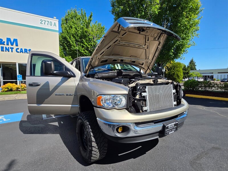 2004 Dodge Ram 2500 SLT 4X4 5.9 L CUMMINS DIESEL / BILSTIEN SUSPENSION LIFT / TUFF COUNTRY LONG ARM / MAYHEM WHEELS / LONG BED / SERVICE RECORDS - Photo 26 - Portland, OR 97217