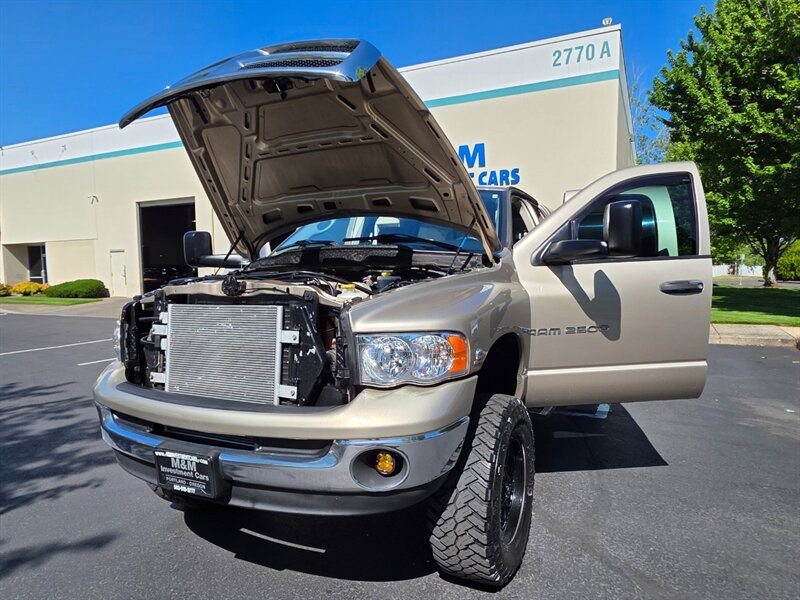 2004 Dodge Ram 2500 SLT 4X4 5.9 L CUMMINS DIESEL / BILSTIEN SUSPENSION LIFT / TUFF COUNTRY LONG ARM / MAYHEM WHEELS / LONG BED / SERVICE RECORDS - Photo 25 - Portland, OR 97217