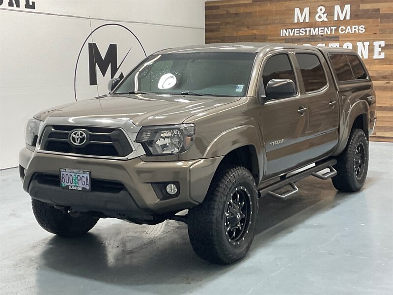 2013 Toyota Tacoma V6 TRD OFF RD 4X4 / LIFTED / LEATHER / CAMERA  /Heated Seats / Backup Camera / Rear Differential Locks / ZERO RUST - Photo 1 - Gladstone, OR 97027