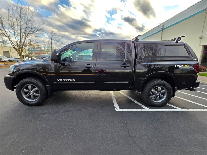 2014 Nissan Titan PRO-4X / 5.6L V8 / CREW CAB / 4X4  / REAR DIFFERENTIAL LOCK / BACK CAM / MATCHING CANOPY - Photo 3 - Portland, OR 97217