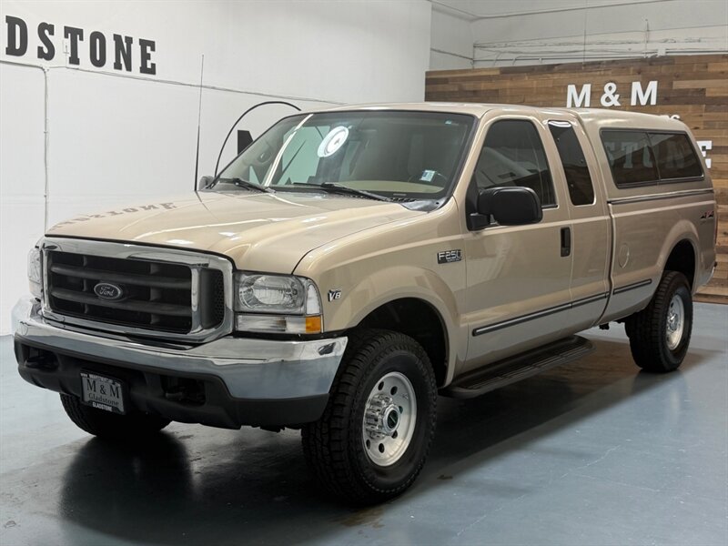 1999 Ford F-250 Super Duty XLT 4X4 / 5.4L V8 / Long Bed /ZERO RUST  / LOW MILES - Photo 1 - Gladstone, OR 97027