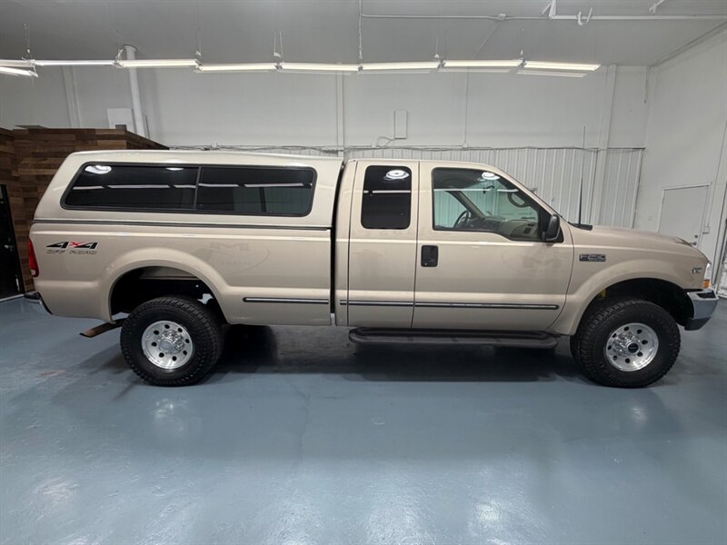 1999 Ford F-250 Super Duty XLT 4X4 / 5.4L V8 / Long Bed /ZERO RUST  / LOW MILES - Photo 4 - Gladstone, OR 97027
