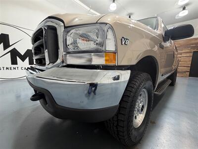 1999 Ford F-250 Super Duty XLT 4X4 / 5.4L V8 / Long Bed /ZERO RUST  / LOW MILES - Photo 51 - Gladstone, OR 97027
