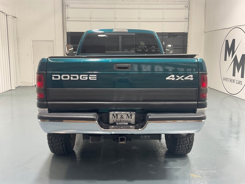 1999 Dodge Ram 2500 Laramie SLT 4dr Quad Cab 4X4 /5.9L DIESEL /5-SPEED / Long bed / LIFTED w. 35 " TIRES & 17 " MOTO WHEELS / ZERO RUST / 5-SPEED MANUAL - Photo 7 - Gladstone, OR 97027