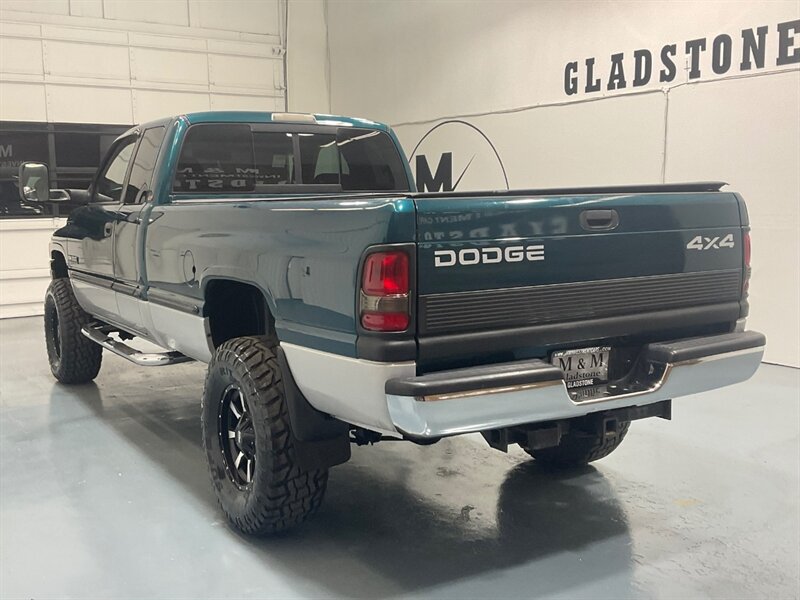 1999 Dodge Ram 2500 Laramie SLT 4dr Quad Cab 4X4 /5.9L DIESEL /5-SPEED / Long bed / LIFTED w. 35 " TIRES & 17 " MOTO WHEELS / ZERO RUST / 5-SPEED MANUAL - Photo 10 - Gladstone, OR 97027
