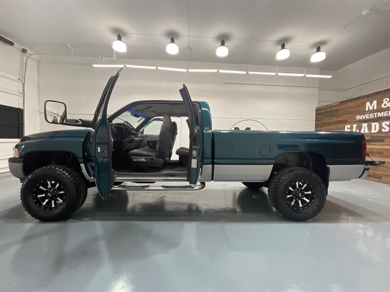 1999 Dodge Ram 2500 Laramie SLT 4dr Quad Cab 4X4 /5.9L DIESEL /5-SPEED / Long bed / LIFTED w. 35 " TIRES & 17 " MOTO WHEELS / ZERO RUST / 5-SPEED MANUAL - Photo 5 - Gladstone, OR 97027