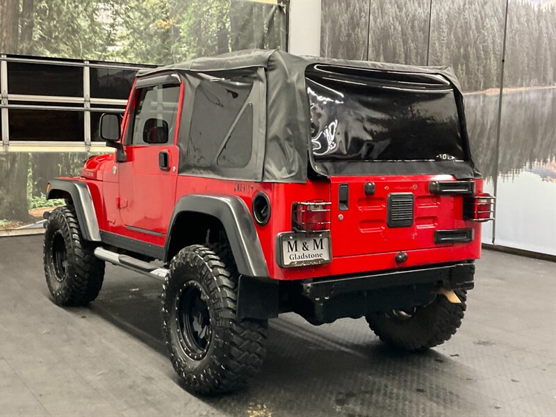 2005 Jeep Wrangler Rubicon 2Dr 4X4 / 4.0L 6Cyl / 6-SPEED / LIFTED  BRAND NEW TOP / LIFTED w/ MUD TIRES / WINCH & GRILL GUARD / SHARP & CLEAN !! - Photo 8 - Gladstone, OR 97027