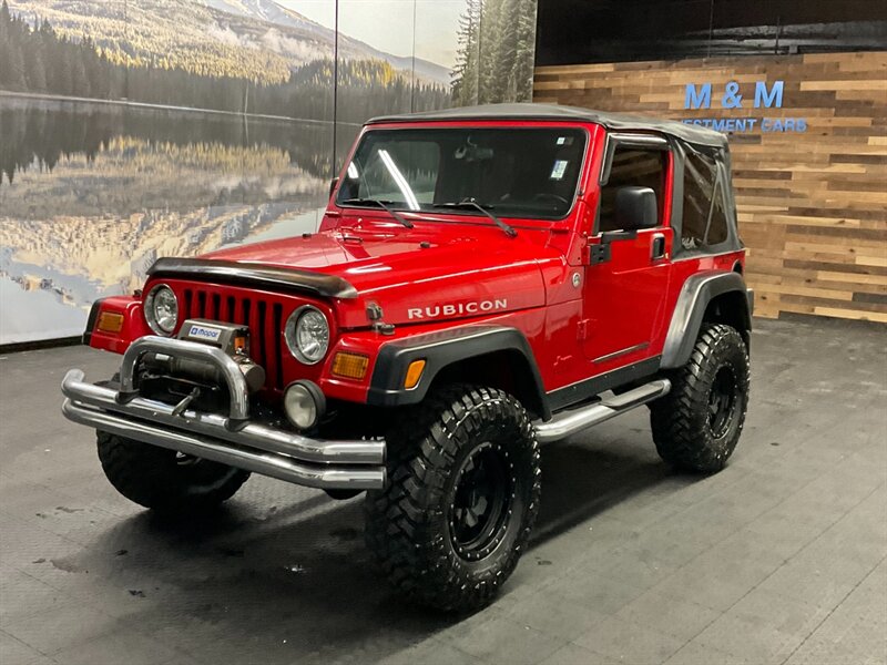 2005 Jeep Wrangler Rubicon 2Dr 4X4 / 4.0L 6Cyl / 6-SPEED / LIFTED  BRAND NEW TOP / LIFTED w/ MUD TIRES / WINCH & GRILL GUARD / SHARP & CLEAN !! - Photo 1 - Gladstone, OR 97027