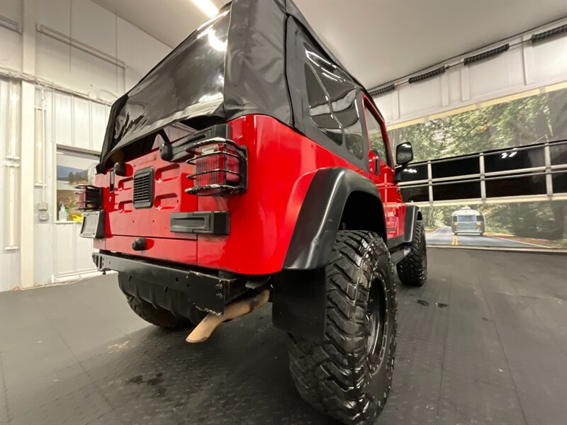 2005 Jeep Wrangler Rubicon 2Dr 4X4 / 4.0L 6Cyl / 6-SPEED / LIFTED  BRAND NEW TOP / LIFTED w/ MUD TIRES / WINCH & GRILL GUARD / SHARP & CLEAN !! - Photo 11 - Gladstone, OR 97027