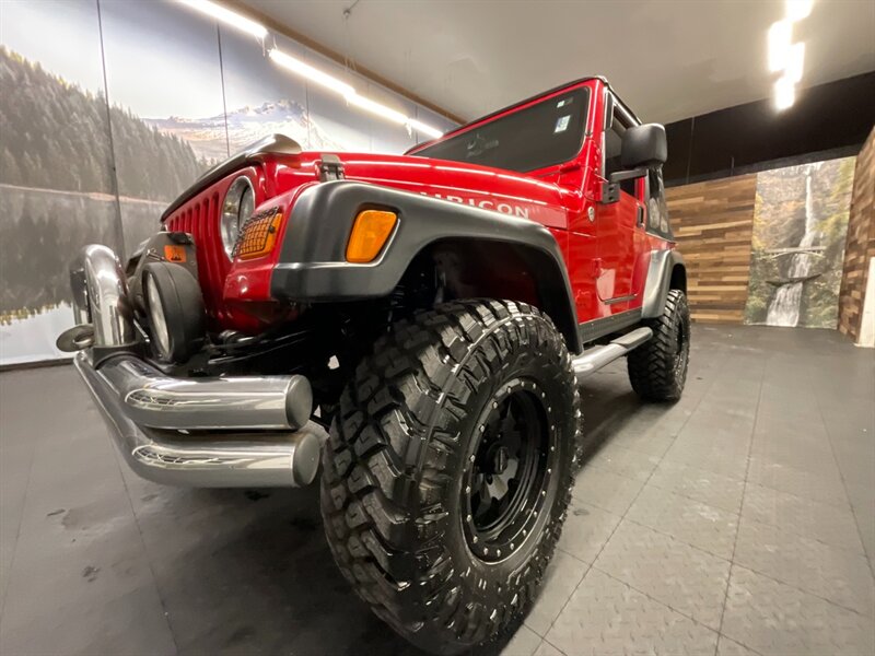 2005 Jeep Wrangler Rubicon 2Dr 4X4 / 4.0L 6Cyl / 6-SPEED / LIFTED  BRAND NEW TOP / LIFTED w/ MUD TIRES / WINCH & GRILL GUARD / SHARP & CLEAN !! - Photo 9 - Gladstone, OR 97027