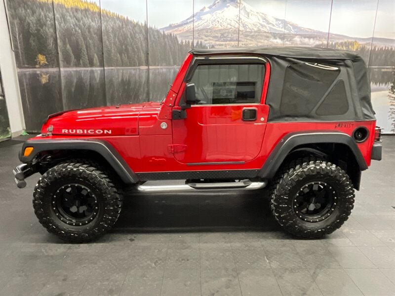 2005 Jeep Wrangler Rubicon 2Dr 4X4 / 4.0L 6Cyl / 6-SPEED / LIFTED  BRAND NEW TOP / LIFTED w/ MUD TIRES / WINCH & GRILL GUARD / SHARP & CLEAN !! - Photo 3 - Gladstone, OR 97027