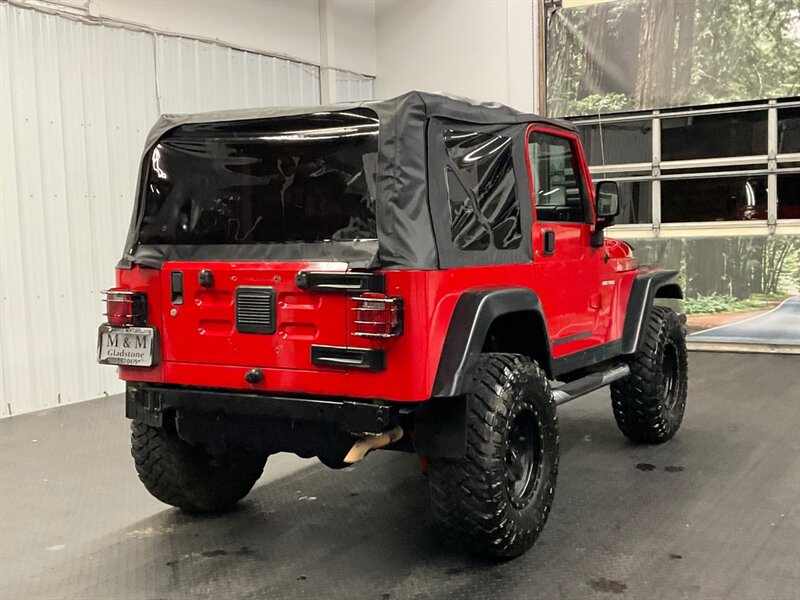 2005 Jeep Wrangler Rubicon 2Dr 4X4 / 4.0L 6Cyl / 6-SPEED / LIFTED  BRAND NEW TOP / LIFTED w/ MUD TIRES / WINCH & GRILL GUARD / SHARP & CLEAN !! - Photo 7 - Gladstone, OR 97027