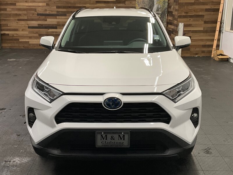 2021 Toyota RAV4 HYBRID XLE AWD / Heated Seats / ONLY 5,000 MILES  1-OWNER / LIKE NEW CONDITION / Cold Weather Pkg / Backup Camera - Photo 5 - Gladstone, OR 97027