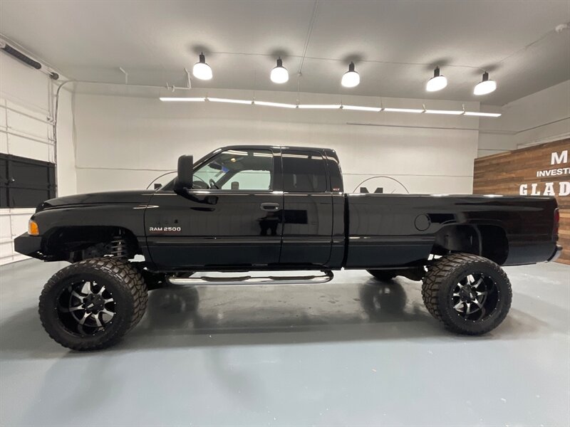 2001 Dodge Ram 2500 Laramie Quad Cab 4X4 / 5.9L DIESEL/1-OWNER /LIFTED / Leather Seats / CUSTOM BUILT / NEW LIFT + NEW WHEELS + NEW TIRES + NEW CUSTOM BUMPER w. LIGHT BAR / ZERO RUST - Photo 3 - Gladstone, OR 97027
