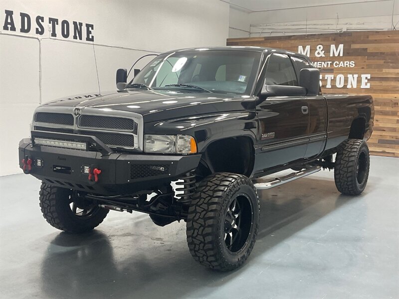 2001 Dodge Ram 2500 Laramie Quad Cab 4X4 / 5.9L DIESEL/1-OWNER /LIFTED / Leather Seats / CUSTOM BUILT / NEW LIFT + NEW WHEELS + NEW TIRES + NEW CUSTOM BUMPER w. LIGHT BAR / ZERO RUST - Photo 1 - Gladstone, OR 97027