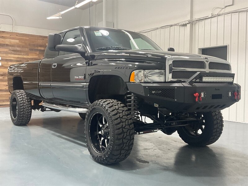 2001 Dodge Ram 2500 Laramie Quad Cab 4X4 / 5.9L DIESEL/1-OWNER /LIFTED / Leather Seats / CUSTOM BUILT / NEW LIFT + NEW WHEELS + NEW TIRES + NEW CUSTOM BUMPER w. LIGHT BAR / ZERO RUST - Photo 2 - Gladstone, OR 97027