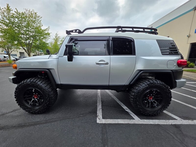 2007 Toyota FJ Cruiser 4X4 V6 / REAR DIFFERENTIAL LOCKER / TRD WHEELS  / KSP CONTROL ARMS / NEW TIRES / LIFTED / SERVICE RECORDS / ZERO RUST - Photo 4 - Portland, OR 97217