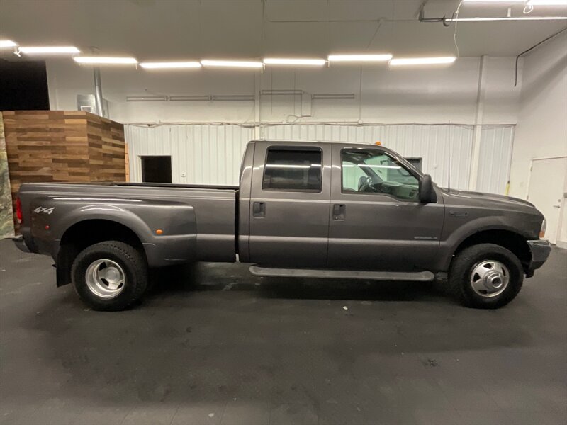 2002 Ford F-350 LARIAT Crew Cab 4X4 / 7.3L DIESEL / DUALLY / LOCAL  Leather Seats / LONG BED / DUALLY / LOCAL TRUCK/ RUST FREE / NEW TIRES / ONLY 130,000 MILES - Photo 4 - Gladstone, OR 97027