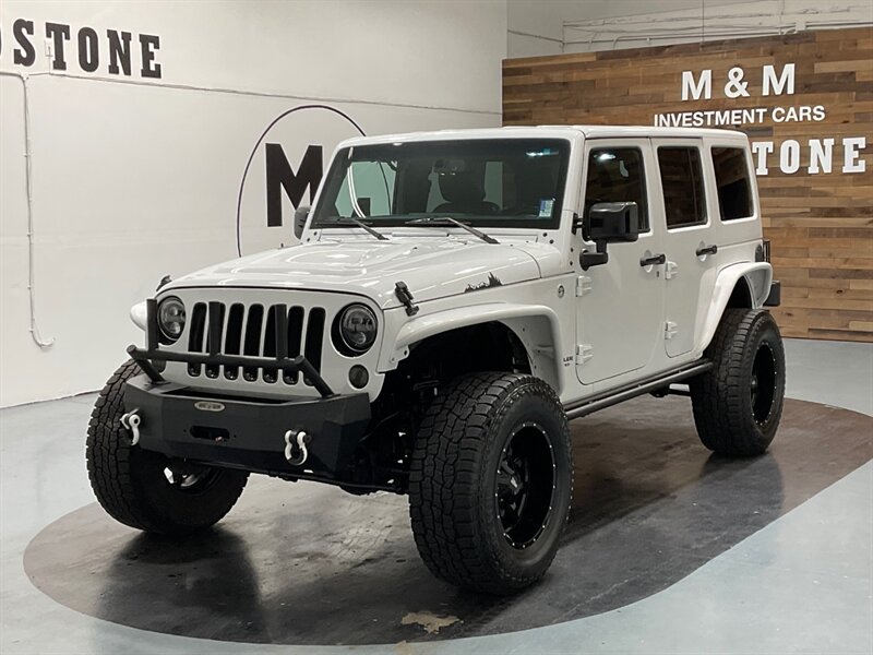 2015 Jeep Wrangler Unlimited Altitude 4X4 / 6-Speed Manual / LIFTED  / LOCAL SUV w. NO RUST - Photo 1 - Gladstone, OR 97027