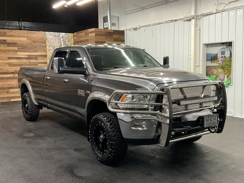 2015 RAM 2500 SLT Crew Cab 4X4 / 5.7L HEMI / LONG BED / LIFTED  LOCAL TRUCK / RUST FREE / LIFTED w/ 33 " TOYO MUD TIRES & 18 " AMERICAN RACING WHEELS / GRILL / WINCH / LIGHT BAR / SHARP SHARP - Photo 2 - Gladstone, OR 97027