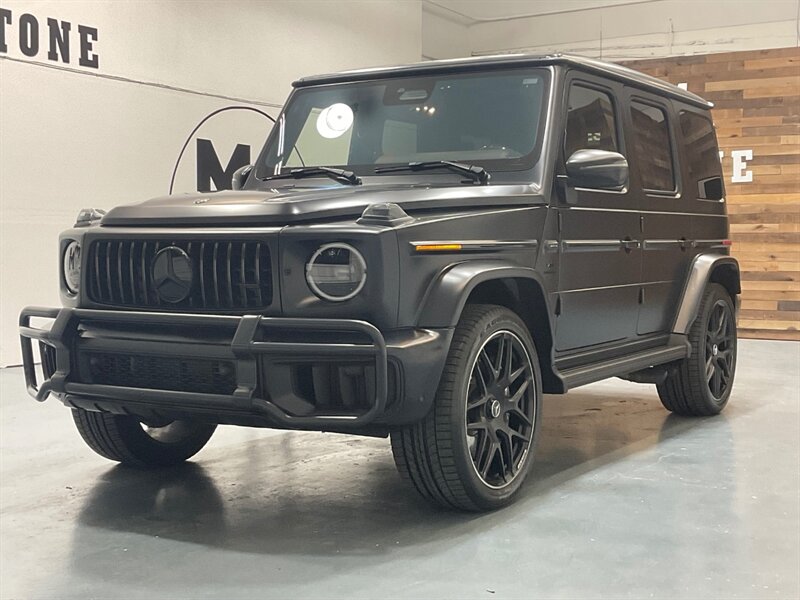2025 Mercedes-Benz AMG G 63 4WD / 4.0L V8 TwinTurbo /ONLY 1,200 MILES  / 22 " AMG cross spoke forged wheels/MBUX high end Rear Seat Entertainment / Armrest heating / MANUFAKTUR interior package plus / AMG Night Pkg - Photo 1 - Gladstone, OR 97027