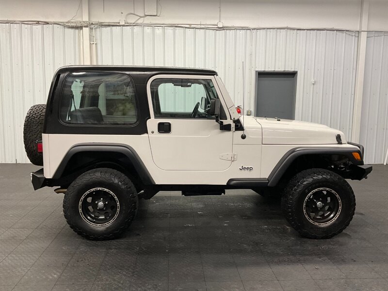 1998 Jeep Wrangler Sport 4X4 / 4.0L 6Cyl / 6-SPEED / LIFTED  CUSTOM BUMPERS w/ WINCH / HARD TOP / LOCAL SUV / RUST FREE / SHARP & CLEAN !! - Photo 4 - Gladstone, OR 97027