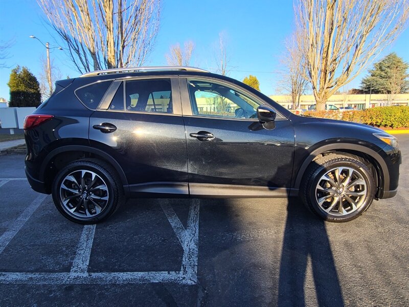 2016 Mazda CX-5 GRAND TOURING / ALL WHEEL DRIVE  / TECHNOLOGY PACKAGE / BLIS / NAVIGATION / LEATHER / SUN ROOF / FULLY LOADED - Photo 4 - Portland, OR 97217