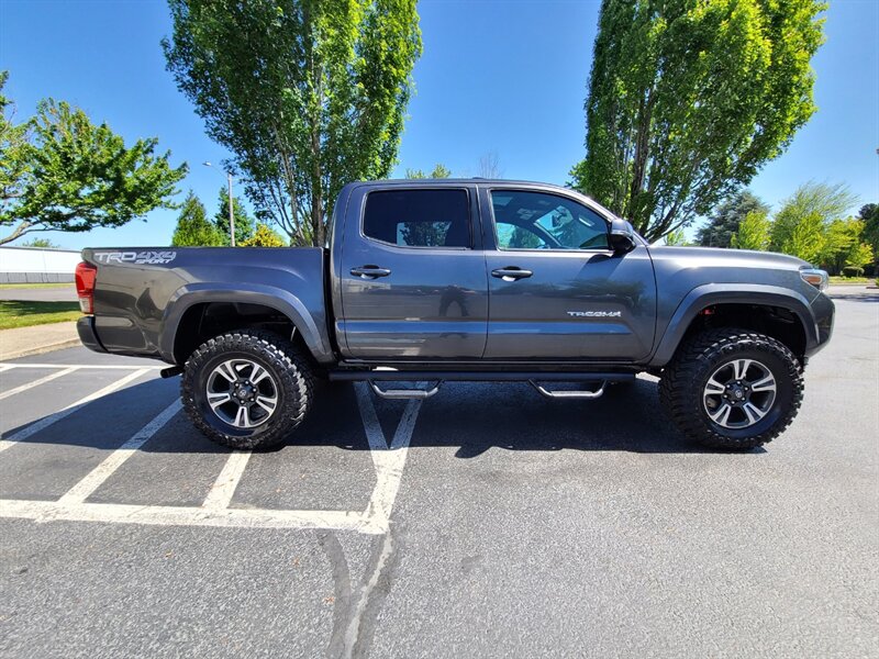 2017 Toyota Tacoma Double Cab V6 4X4 TRD HEATED SEATS SUN ROOF LIFTED  / PREMIUM & TECH PKG / NAVIGATION / CAM / NEW TIRES - Photo 4 - Portland, OR 97217