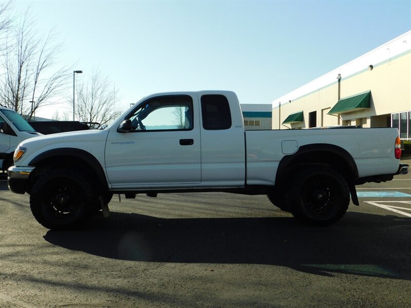 2002 Toyota Tacoma 2dr Xtracab 4X4 / 5-SPEED / LIFTED / LOW MILES   - Photo 3 - Portland, OR 97217