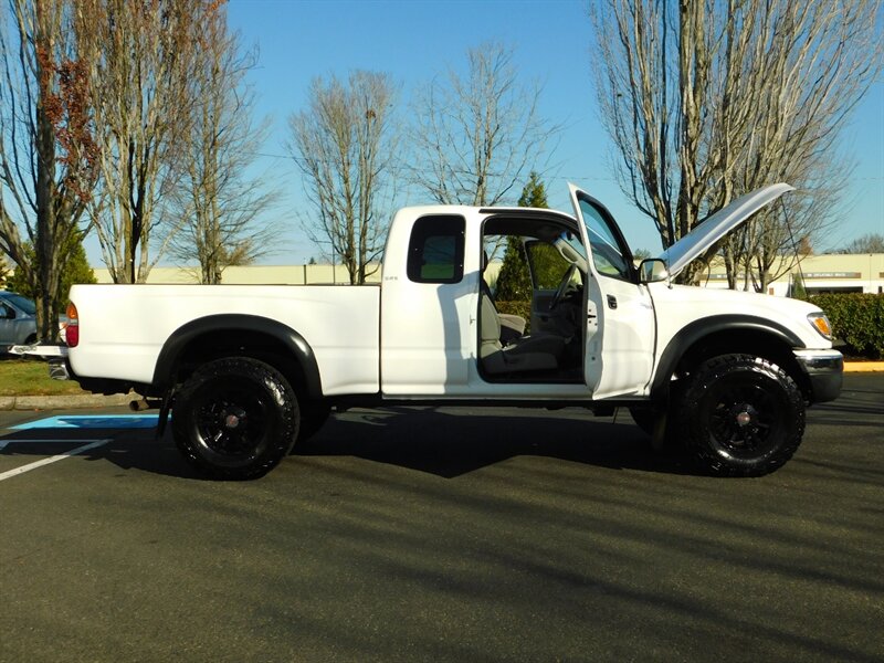 2002 Toyota Tacoma 2dr Xtracab 4X4 / 5-SPEED / LIFTED / LOW MILES   - Photo 29 - Portland, OR 97217