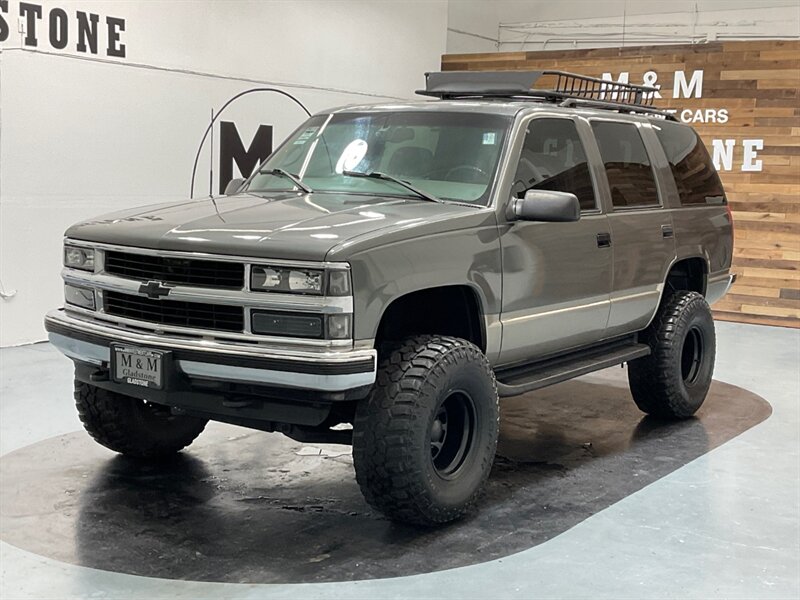 1999 Chevrolet Tahoe LS Sport Utility 4X4 / 5.7L V8 / LIFTED LIFTED  / NO RUST / 164K MILES - Photo 1 - Gladstone, OR 97027