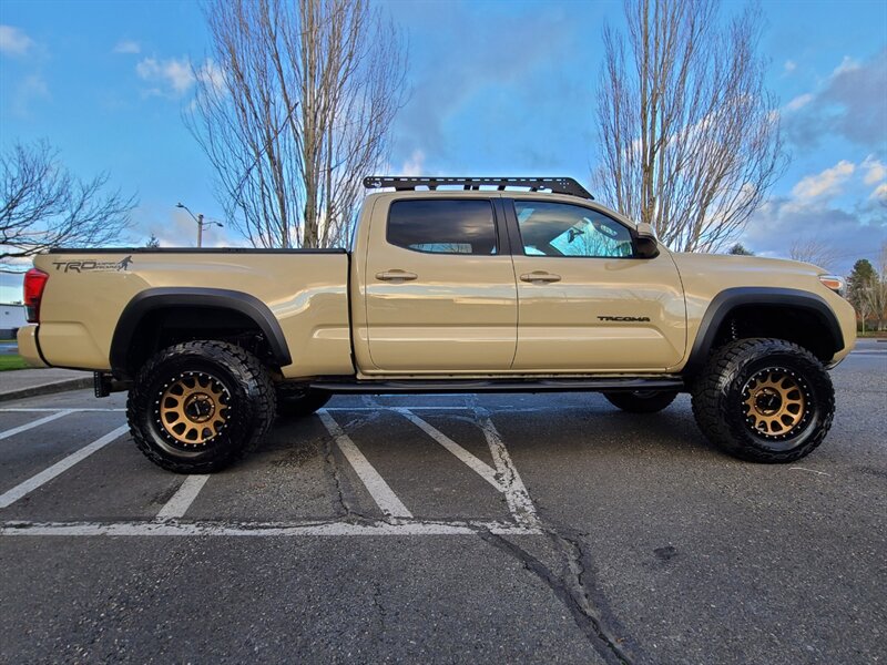 2017 Toyota Tacoma LONG BED 4X4 TRD CRAWL CONTROL  DIFF LOCK / LIFTED  / TRD OFF ROAD / BLIND SPOT MONITOR / NAVi / CAM / SUN ROOF / HEATED SEATS / METHOD WHEELS / TOYO TIRES / PRINSU RACK - Photo 4 - Portland, OR 97217