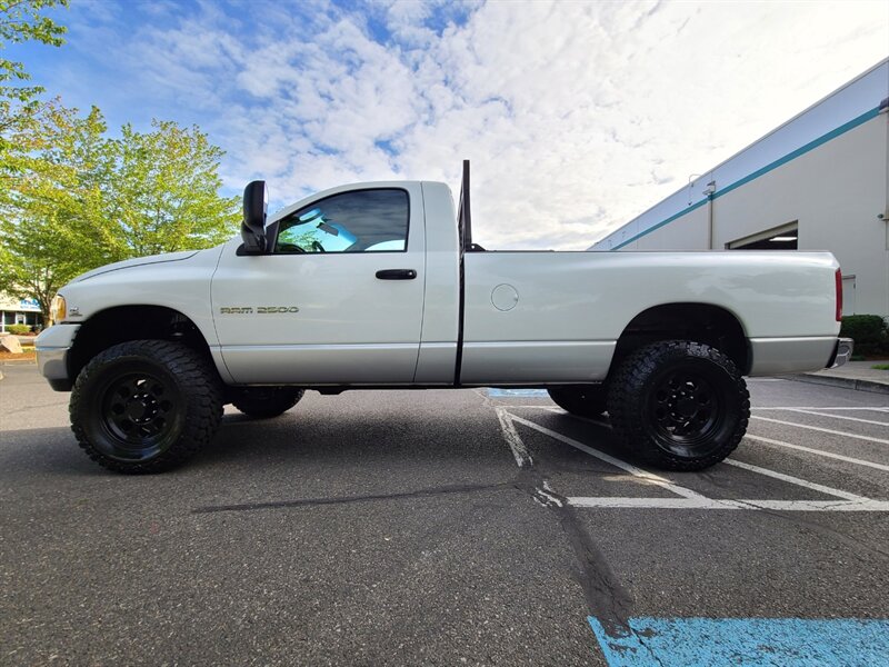 2003 Dodge Ram 2500 4X4 Regular Cab / 5.9 L DIESEL / 6 SPEED / LIFTED  / CUMMINS TURBO / MANUAL TRANSMISSION / LONG BED / 1-OWNER - Photo 3 - Portland, OR 97217