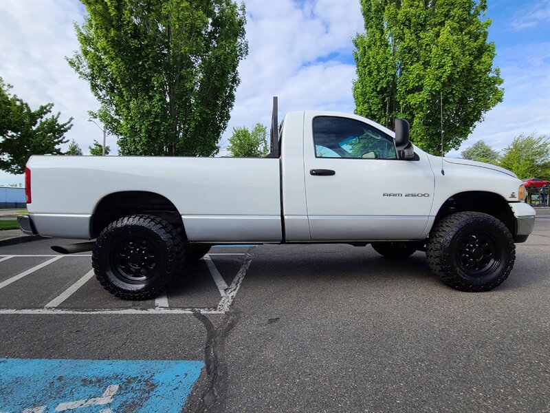 2003 Dodge Ram 2500 4X4 Regular Cab / 5.9 L DIESEL / 6 SPEED / LIFTED  / CUMMINS TURBO / MANUAL TRANSMISSION / LONG BED / 1-OWNER - Photo 4 - Portland, OR 97217