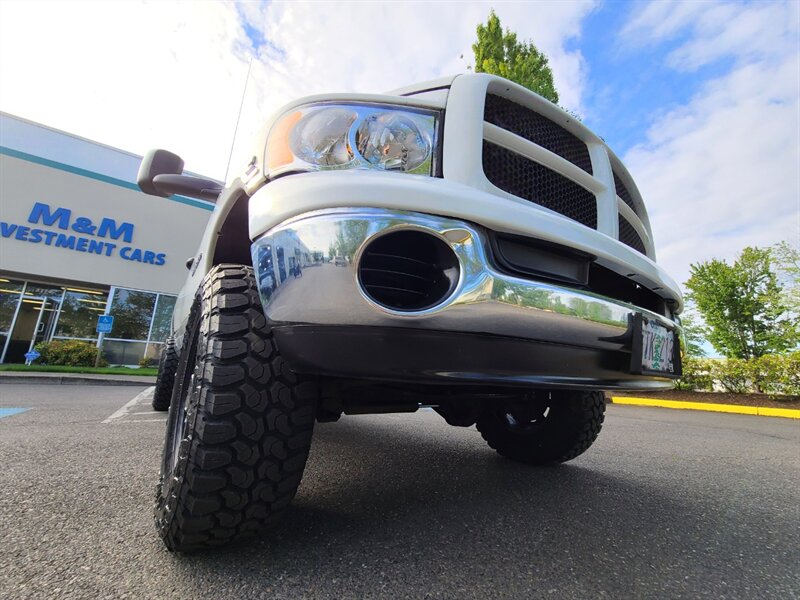 2003 Dodge Ram 2500 4X4 Regular Cab / 5.9 L DIESEL / 6 SPEED / LIFTED  / CUMMINS TURBO / MANUAL TRANSMISSION / LONG BED / 1-OWNER - Photo 9 - Portland, OR 97217