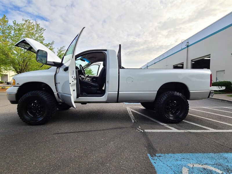 2003 Dodge Ram 2500 4X4 Regular Cab / 5.9 L DIESEL / 6 SPEED / LIFTED  / CUMMINS TURBO / MANUAL TRANSMISSION / LONG BED / 1-OWNER - Photo 23 - Portland, OR 97217