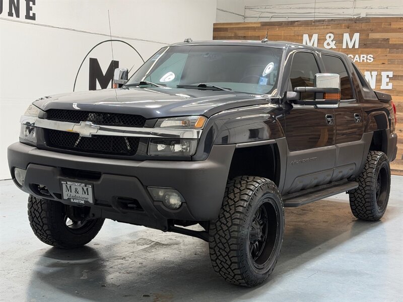 2004 Chevrolet Avalanche 2500 4X4 8.1L V8 / LIFTED w. NEW TIRES /ZERO RUST / Leather w. Heated Seats / Sunroof / Backup Camera - Photo 57 - Gladstone, OR 97027