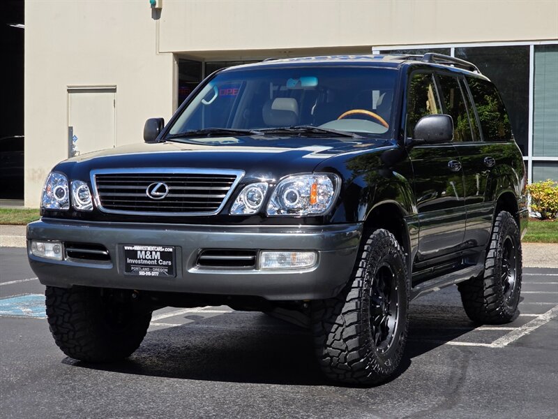 2002 Lexus LX 470 4WD / BRAND NEW OLD MAN EMU LIFT / FRESH TIMING BELT + WATER PUMP / BRAND NEW WHEELS + MUD TIRES / LEATHER / LOADED - Photo 1 - Portland, OR 97217