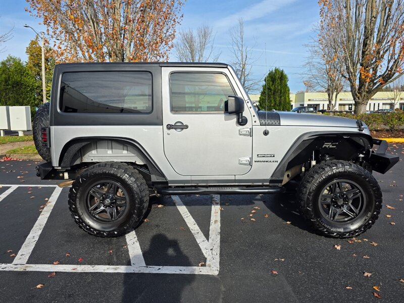 2015 Jeep Wrangler Sport X4 / 6 SPEED MANUAL / SUSPENSION LIFT  / BUMPERS / AMERICAN OUTLAW WHEELS / SERVICE RECORDS - Photo 4 - Portland, OR 97217