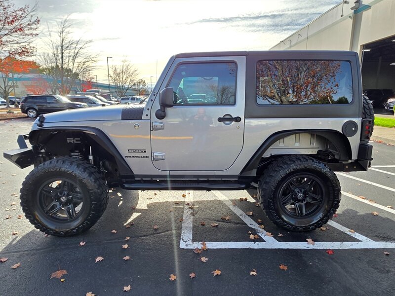 2015 Jeep Wrangler Sport X4 / 6 SPEED MANUAL / SUSPENSION LIFT  / BUMPERS / AMERICAN OUTLAW WHEELS / SERVICE RECORDS - Photo 3 - Portland, OR 97217